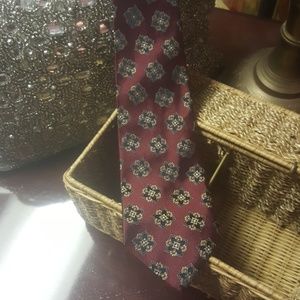 Reed's Rivitz of Boston red tie with black, gold